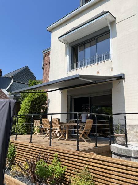 Motorisation Somfy IO sur store banne à Duclair
